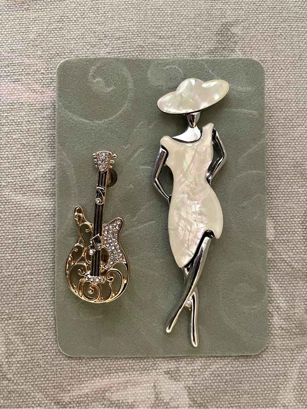 Two Brooches